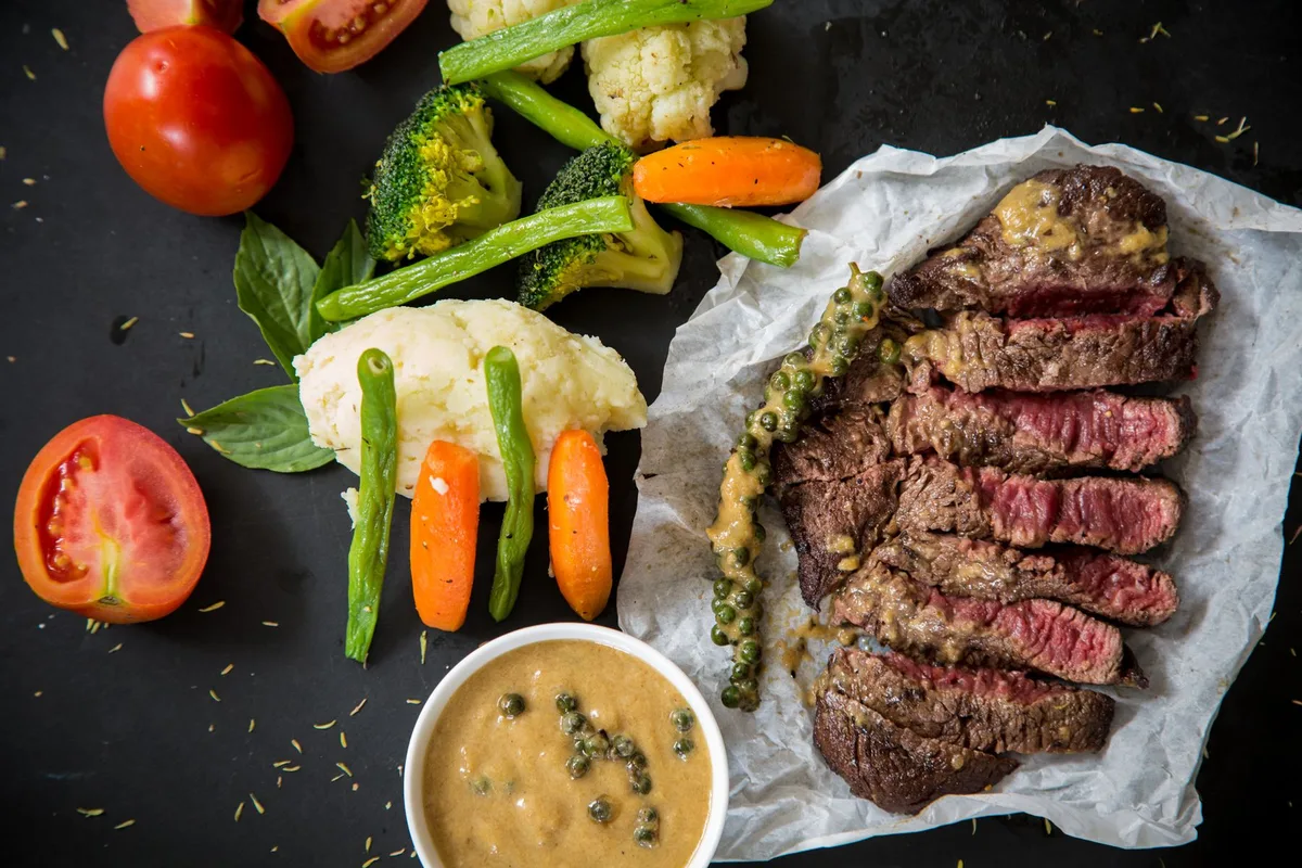 Steak with vegetables and sauce